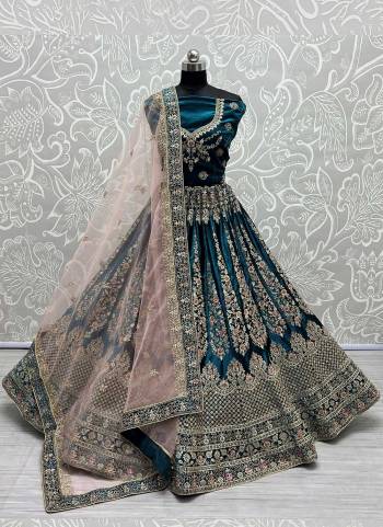 For A Designer Look,Grab These Lehenga Choli in Fine Colored.These Lehenga Choli Are Velvet And Dupatta Are Fabricated On Soft Net Pair.Its Beautified With Fancy Designer Multy,Dori Embroidery,Diamond Work.