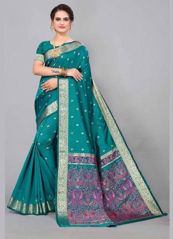 Garb This Wedding Partywear Saree Paired With Blouse.This Saree And Blouse Are Silk Based Fabric With Weaving Jacquard Rich Designer. Buy This Pretty Saree Now.