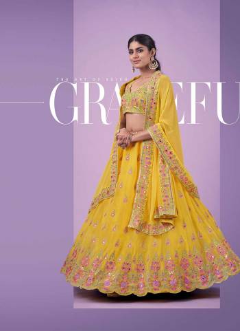 For A Designer Look,Grab These Lehenga Choli in Fine Colored.These Lehenga And Blouse Are Fabricated On Georgette Pair With Georgette Dupatta.Its Beautified With Designer Thread,Jari,Mirror Embroidery Work.