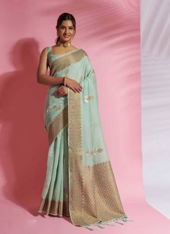 Look Attrective These Party Wear Saree in Fine Colored.These Saree And Blouse  is Fabricated On Modal Cotton.Its Beautified With Heavy Wevon Designer.