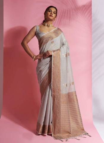 Look Attrective These Party Wear Saree in Fine Colored.These Saree And Blouse  is Fabricated On Modal Cotton.Its Beautified With Heavy Wevon Designer.