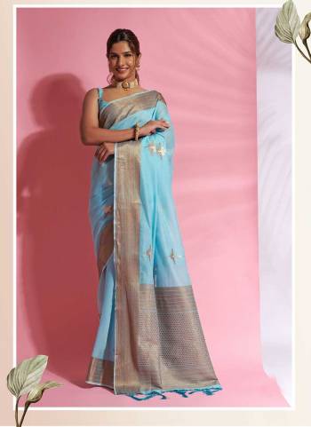 Look Attrective These Party Wear Saree in Fine Colored.These Saree And Blouse  is Fabricated On Modal Cotton.Its Beautified With Heavy Wevon Designer.