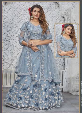 For A Designer Look,Grab These Semi Stitched Lehenga Choli in Fine Colored.These Lehenga And Blouse Are Fabricated On Net Pair With Net Dupatta.Its Beautified With Designer Heavy Embroidery Work.