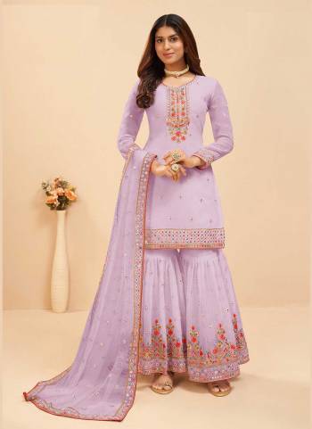 Attrective These Sharara Suit in Fine Colored Pair With Bottom And Dupatta.These Top And Dupatta Are Fabricated On Faux Georgette Pair With Faux Georgette Bottom.Its Beautified With Santoon Inner.Its Beautified With Heavy Designer Mirror,Multy Embroidery Work.