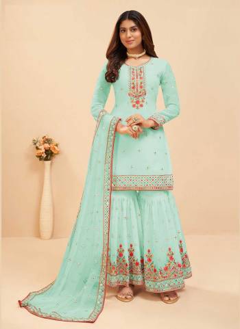 Attrective These Sharara Suit in Fine Colored Pair With Bottom And Dupatta.These Top And Dupatta Are Fabricated On Faux Georgette Pair With Faux Georgette Bottom.Its Beautified With Santoon Inner.Its Beautified With Heavy Designer Mirror,Multy Embroidery Work.