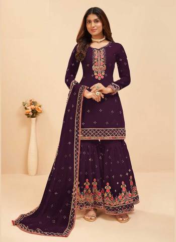 Attrective These Sharara Suit in Fine Colored Pair With Bottom And Dupatta.These Top And Dupatta Are Fabricated On Faux Georgette Pair With Faux Georgette Bottom.Its Beautified With Santoon Inner.Its Beautified With Heavy Designer Mirror,Multy Embroidery Work.