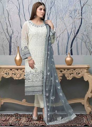 Garb These Designer Suit in Fine Colored Pair With Bottom And Dupatta.These Top Are Faux Georgette And Dupatta Are Fabricated On Net Pair With Santoon Bottom.Its Beautified With Santoon Inner.Its Beautified With Designer Embroidery Work.