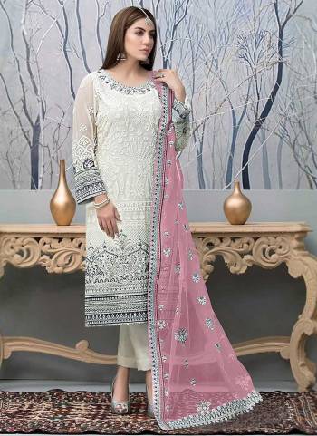 Garb These Designer Suit in Fine Colored Pair With Bottom And Dupatta.These Top Are Faux Georgette And Dupatta Are Fabricated On Net Pair With Santoon Bottom.Its Beautified With Santoon Inner.Its Beautified With Designer Embroidery Work.