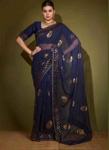 Grab These Saree in Fine Colored.These Saree Are Georgette And Blouse is Mono Banglori Fabricated.Its Beautified With Designer Foil Printed With Sequance Embroidery Work Lace Border.