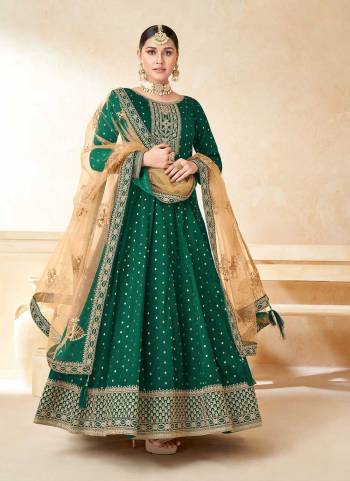 Grab These Anarkali Suit in Fine Colored Pair With Bottom And Dupatta.These Top Are Tafetta Silk And Dupatta Are Fabricated On Net Pair With Santoon Bottom.Its Beautified With Santoon Inner.Its Beautified With Wevon Butti Designer With Embroidery Work.