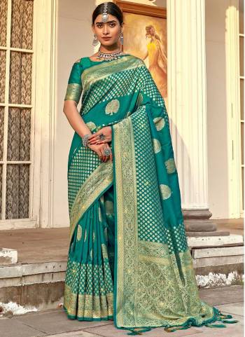 Garb These Party Wear Saree in Fine Colored.These Saree And Blouse is Fabricated On Banarasi Silk.Its Beautified With Weavon Designer With Swarovski Work.