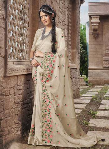 Grab These Party Wear Saree in Fine Light Colored.These Saree Are Organza And Blouse is Fabricated On Banarasi.Its Beautified With Wevon Satin Patta With Embroidery,Swarovski Work.