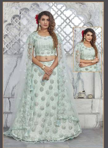 For A Designer Look,Grab These Stitched Lehenga Choli in Fine Colored.These Lehenga And Dupatta Are Fabricated On Net Pair With Satin Silk Dupatta.Its Beautified With Designer Heavy Floral,Sequance Embroidery Work.