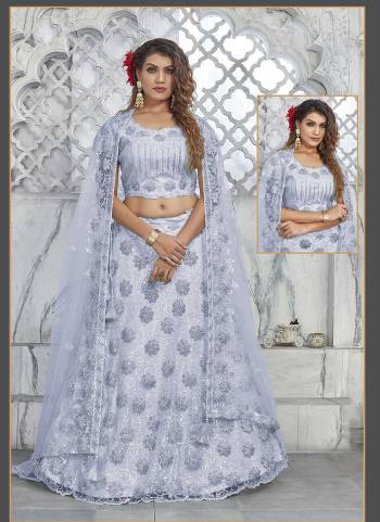 For A Designer Look,Grab These Stitched Lehenga Choli in Fine Colored.These Lehenga And Dupatta Are Fabricated On Net Pair With Satin Silk Dupatta.Its Beautified With Designer Heavy Floral,Sequance Embroidery Work.