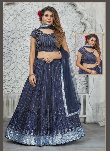 For A Designer Look,Grab These Stitched Lehenga Choli in Fine Colored.These Lehenga And Dupatta Are Fabricated On Net Pair With Satin Silk Dupatta.Its Beautified With Designer Heavy Sequance Embroidery Work.