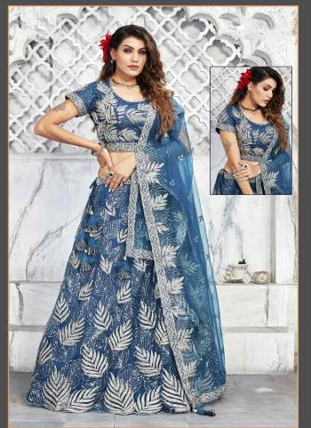 For A Designer Look,Grab These Semi Stitched Lehenga Choli in Fine Colored.These Lehenga And Blouse Are Fabricated On Net,Silk Pair With Net Dupatta.Its Beautified With Designer Heavy Sequance Embroidery Work.