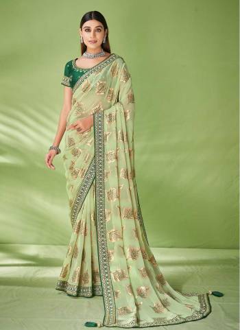 Look Attrective These Party Wear Saree in Fine Colored.These Saree Are Georgette And Blouse  is Fabricated On Raw Silk.Its Beautified With Wevon Designer With Embroidery Work.