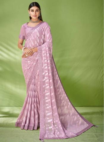 Look Attrective These Party Wear Saree in Fine Colored.These Saree Are Georgette And Blouse  is Fabricated On Raw Silk.Its Beautified With Wevon Designer With Embroidery Work.