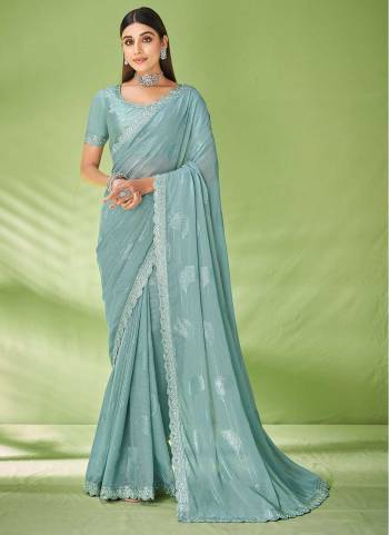 Look Attrective These Party Wear Saree in Fine Colored.These Saree Are Georgette And Blouse  is Fabricated On Raw Silk.Its Beautified With Wevon Designer With Embroidery Work.