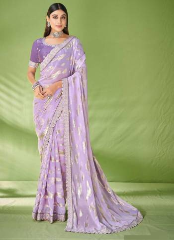 Look Attrective These Party Wear Saree in Fine Colored.These Saree Are Georgette And Blouse  is Fabricated On Raw Silk.Its Beautified With Wevon Designer With Embroidery Work.