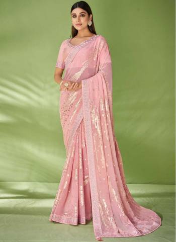 Look Attrective These Party Wear Saree in Fine Colored.These Saree Are Georgette And Blouse  is Fabricated On Raw Silk.Its Beautified With Wevon Designer With Embroidery Work.