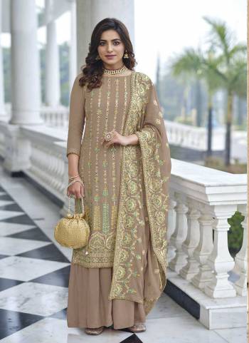 Attrective These Sharara Suit in Fine Colored Pair With Bottom And Dupatta.These Top And Dupatta Are Fabricated On Faux Georgette Pair With Santoon Bottom.Its Beautified With Santoon Inner.Its Beautified With Heavy Designer Multy Thread Embroidery Work.