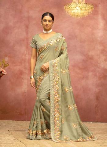 Look Attrective These Designer Party Wear Saree in Fine Colored.These Saree And Blouse is Fabricated On Net.Its Beautified With Floral Embroidery With Golden Ston Work.