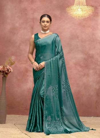 Look Attrective These Designer Party Wear Saree in Fine Colored.These Saree And Blouse is Fabricated On Satin Silk.Its Beautified With Floral Swaroski Stone With Tassels Work. 