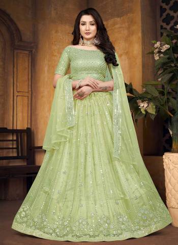 For A Designer Look,Grab These Lehenga Choli in Fine Colored.These Lehenga And Blouse Are Fabricated On Butterfly Net Pair With Butterfly Net Dupatta.Its Beautified With Mirror,Thread Embroidery Work.