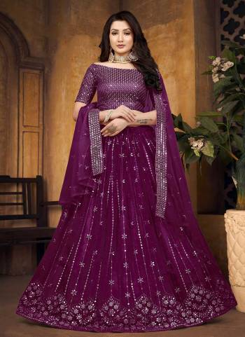 For A Designer Look,Grab These Lehenga Choli in Fine Colored.These Lehenga And Blouse Are Fabricated On Butterfly Net Pair With Butterfly Net Dupatta.Its Beautified With Mirror,Thread Embroidery Work.