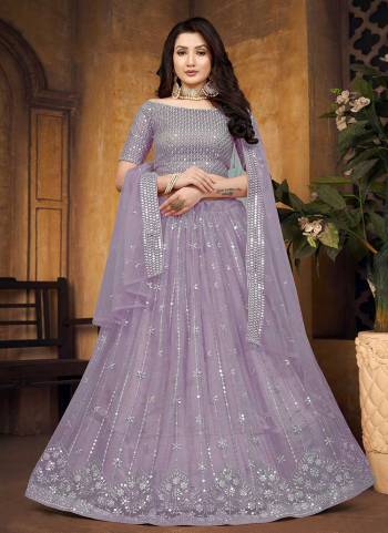 For A Designer Look,Grab These Lehenga Choli in Fine Colored.These Lehenga And Blouse Are Fabricated On Butterfly Net Pair With Butterfly Net Dupatta.Its Beautified With Mirror,Thread Embroidery Work.