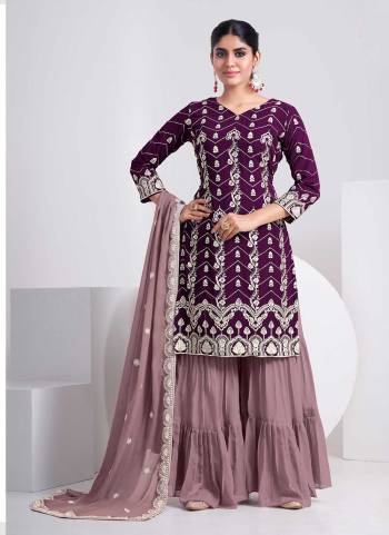 Attrective These Sharara Suit in Fine Colored Pair With Bottom And Dupatta.These Top And Dupatta Are Fabricated On Faux Georgette Pair With Faux Georgette Bottom.Its Beautified With Butter Crepe Inner.Its Beautified With Heavy Designer Multy Thread,Sequance Embroidery Work.