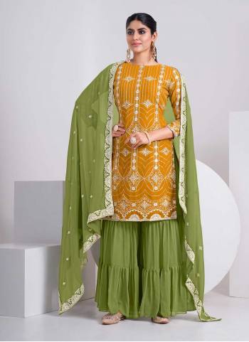 Attrective These Sharara Suit in Fine Colored Pair With Bottom And Dupatta.These Top And Dupatta Are Fabricated On Faux Georgette Pair With Faux Georgette Bottom.Its Beautified With Butter Crepe Inner.Its Beautified With Heavy Designer Multy Thread,Sequance Embroidery Work.