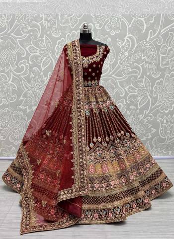 For A Designer Look,Grab These Lehenga Choli in Fine Colored.These Lehenga And Choli Are Velvet And Dupatta Are Fabricated On Soft Net Pair.Its Beautified With Designer Dori,Jari, Multy Thread Embroidery Work.