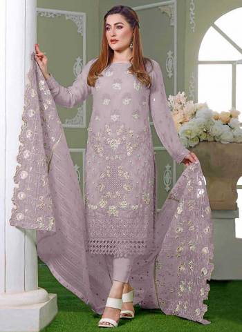 Garb These Designer Suit in Fine Colored Pair With Bottom And Dupatta.These Top Are Faux Georgette And Dupatta Are Fabricated On Nazmeen Pair With Santoon Bottom.Its Beautified With Santoon Inner.Its Beautified With Designer Embroidery Work.