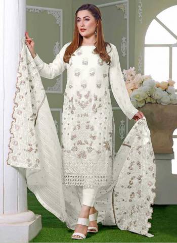 Garb These Designer Suit in Fine Colored Pair With Bottom And Dupatta.These Top Are Faux Georgette And Dupatta Are Fabricated On Nazmeen Pair With Santoon Bottom.Its Beautified With Santoon Inner.Its Beautified With Designer Embroidery Work.