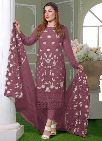 Garb These Designer Suit in Fine Colored Pair With Bottom And Dupatta.These Top Are Faux Georgette And Dupatta Are Fabricated On Nazmeen Pair With Santoon Bottom.Its Beautified With Santoon Inner.Its Beautified With Designer Embroidery Work.