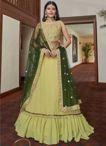 For A Designer Look,Grab These Lehenga Choli in Fine Colored.These Lehenga And Blouse Are Fabricated On Titan Silk Pair With Butterfly Net Blouse.Its Beautified With Designer Mirror,Sequance Embroidery Work.