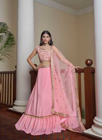 For A Designer Look,Grab These Lehenga Choli in Fine Colored.These Lehenga And Blouse Are Fabricated On Titan Silk Pair With Butterfly Net Blouse.Its Beautified With Designer Mirror,Sequance Embroidery Work.