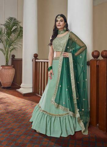 For A Designer Look,Grab These Lehenga Choli in Fine Colored.These Lehenga And Blouse Are Fabricated On Titan Silk Pair With Butterfly Net Blouse.Its Beautified With Designer Mirror,Sequance Embroidery Work.