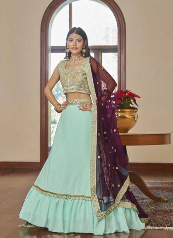 For A Designer Look,Grab These Lehenga Choli in Fine Colored.These Lehenga And Blouse Are Fabricated On Titan Silk Pair With Butterfly Net Blouse.Its Beautified With Designer Mirror,Sequance Embroidery Work.