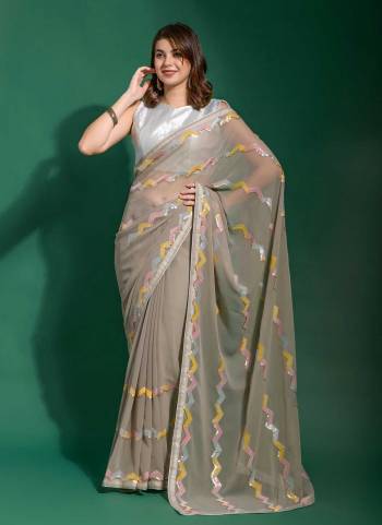 Grab These Saree in Fine Colored.These Saree Are Georgette And Blouse is Satin Jari Silk Fabricated.Its Beautified With Designer Multy Color Sequance Embroidery Work.