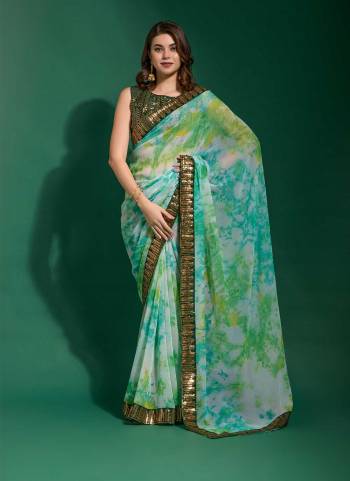 Grab These Party Wear Saree in Fine Colored.These Saree Are Georgette And Blouse is Mono Banglori Fabricated.Its Beautified With Designer Prijam Printed With Emboss Sequance Embroidery Work Lace Border.