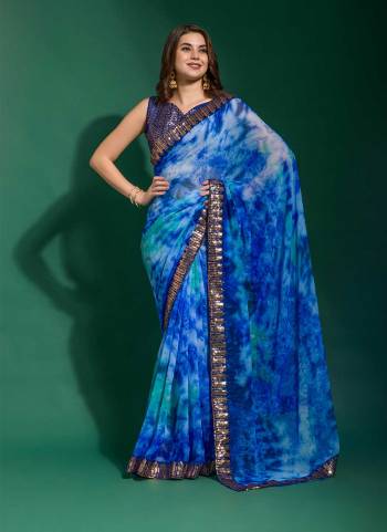 Grab These Party Wear Saree in Fine Colored.These Saree Are Georgette And Blouse is Mono Banglori Fabricated.Its Beautified With Designer Prijam Printed With Emboss Sequance Embroidery Work Lace Border.