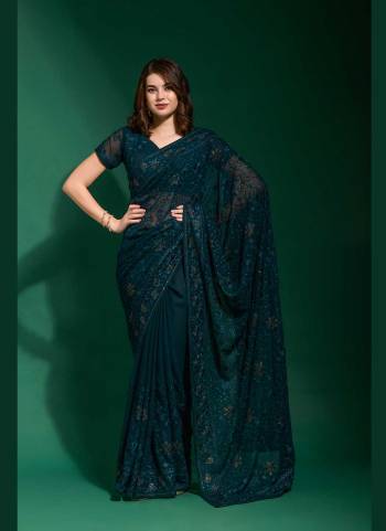 Grab These Party Wear Saree in Fine Colored.These Saree Are Georgette And Blouse is Georgette Fabricated.Its Beautified With Blooming Color,Designer Tone To Tone Thread Embroidery,Diamond Work.