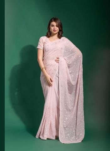 Grab These Party Wear Saree in Fine Colored.These Saree Are Georgette And Blouse is Georgette Fabricated.Its Beautified With Blooming Color,Designer Tone To Tone Thread Embroidery,Diamond Work.