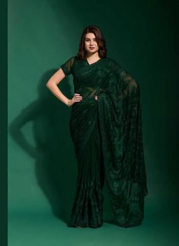 Grab These Party Wear Saree in Fine Colored.These Saree Are Georgette And Blouse is Georgette Fabricated.Its Beautified With Blooming Color,Designer Tone To Tone Thread Embroidery,Diamond Work.