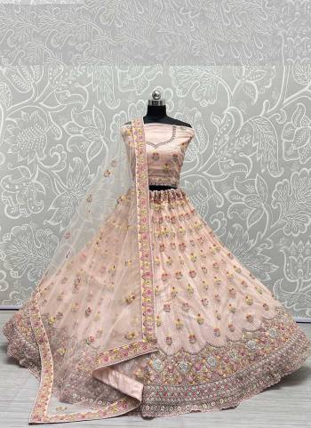 For A Designer Look,Grab These Lehenga Choli in Fine Colored.These Lehenga And Choli Are Bridal Net And Dupatta Are Fabricated On Soft Net Pair.Its Beautified With Designer Dori, Multy Thread Embroidery Work.