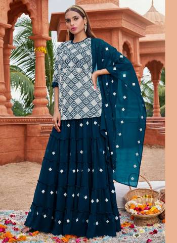 Grab These Designer Free Size Stitched Skirt Suit in Fine Colored Pair With Bottom And Dupatta.These Top And Dupatta Are Fabricated On Faux Georgette Pair With Faux Georgette Bottom.Its Beautified With Micro Row Silk Inner.Its Beautified With Heavy Designer Cotton Embroidery Work.