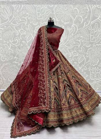 For A Designer Look,Grab These Lehenga Choli With 2 Dupatta in Fine Colored.These Lehenga And Choli Are Velvet And Dupatta Are Fabricated On Soft Net & Velvet Pair.Its Beautified With Designer Fancy Patch Work,Multy Thread Embroidery,Zarkan Diamond Work.